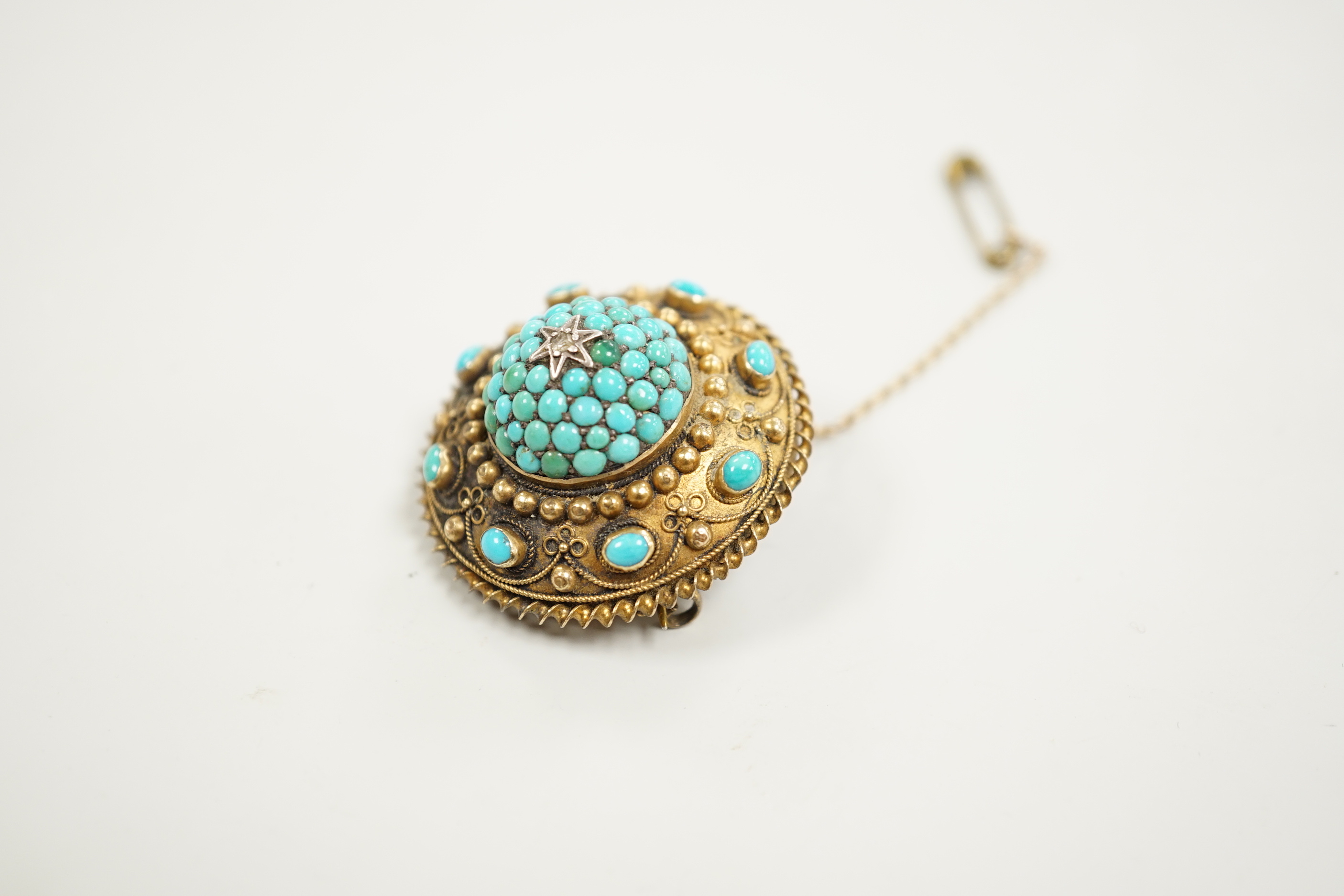 A Victorian yellow metal, turquoise and diamond cluster set domed brooch, 35mm, gross weight 15.2 grams.